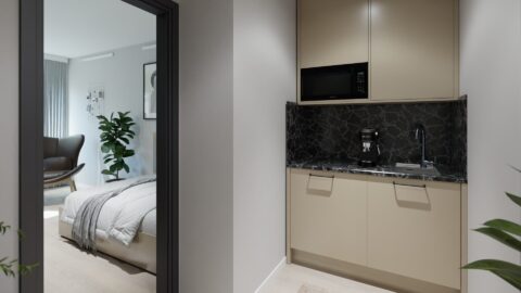Compact kitchenette in a student apartment at Staytoo Munich with hob, sink and microwave