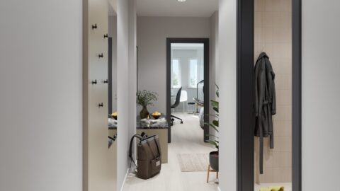 Flur eines Studentenapartments im Staytoo München mit Garderobe, Blick ins Bad und in den Wohn- und Schlafbereich